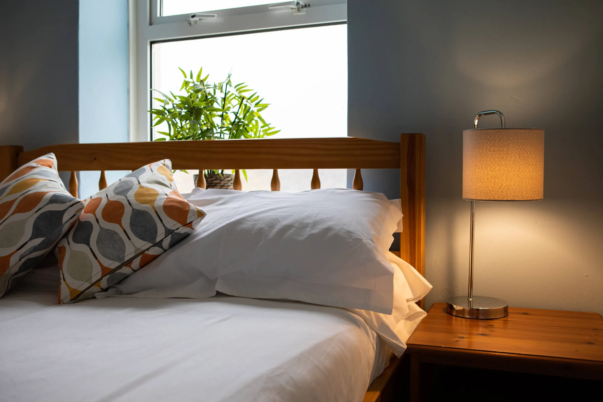 OA Surf club bedroom with double bed and window available for bed and breakfast